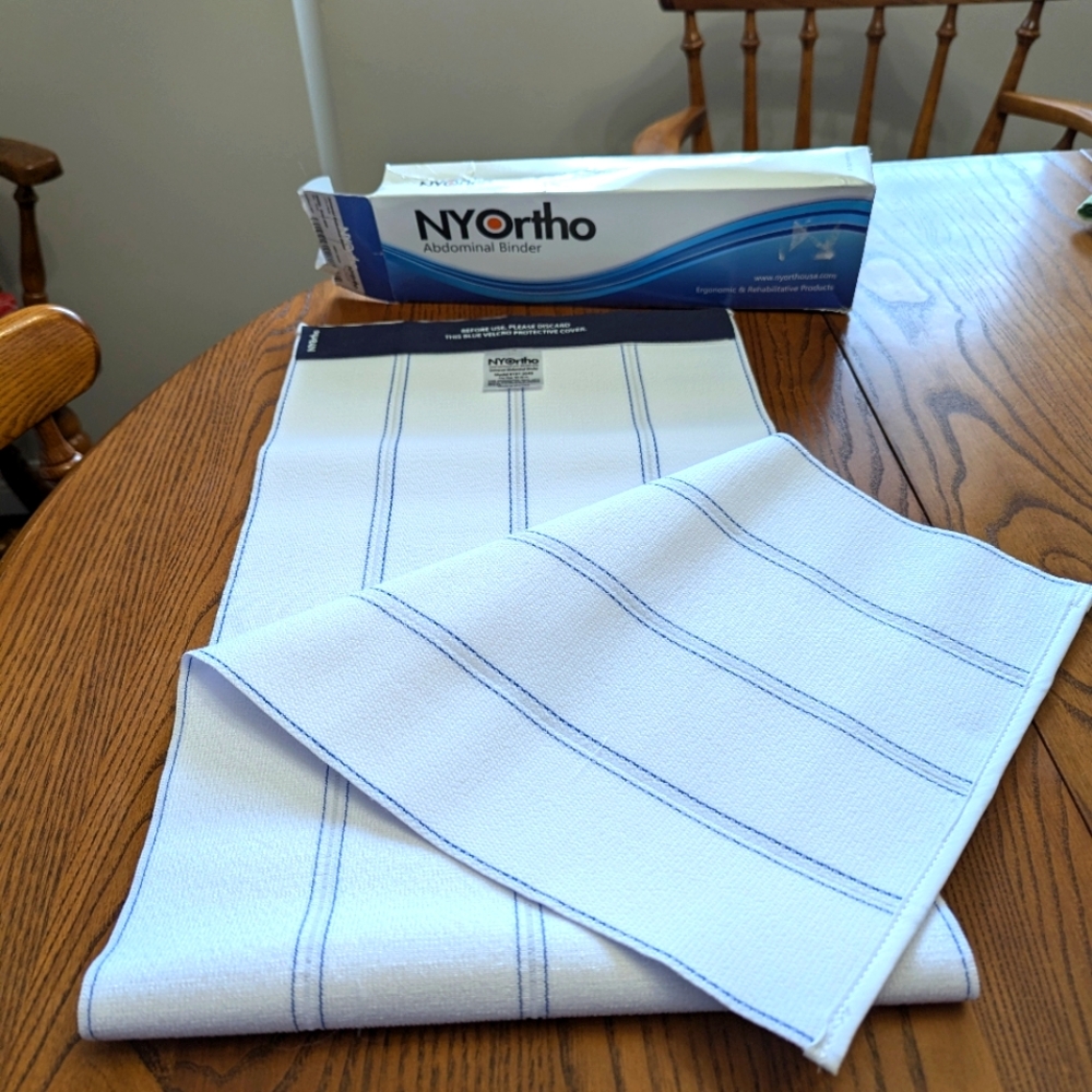 - NYOrtho Abdominal Binder with Blue Stripes. 40 x 12 inches. Like new.